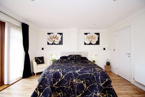 Bedroom One- click for photo gallery